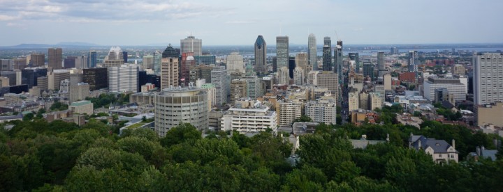 Modern condominium buildings in downtown Montreal at sunset showing urban real estate market trends | Immeubles de condominiums modernes au centre-ville de Montréal au coucher du soleil illustrant le marché immobilier urbain